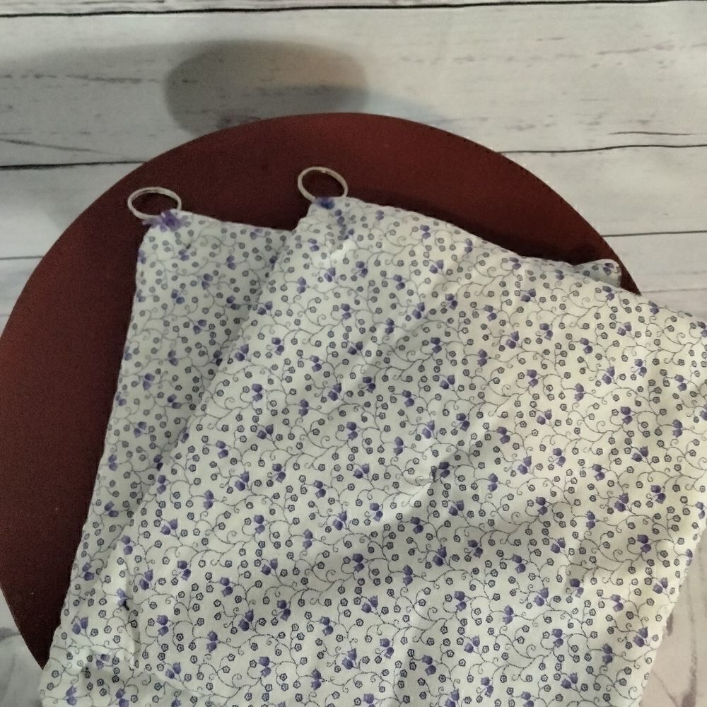 Never used. "Evelyn Jacobs" ( my mom) homemade pot holders for looks